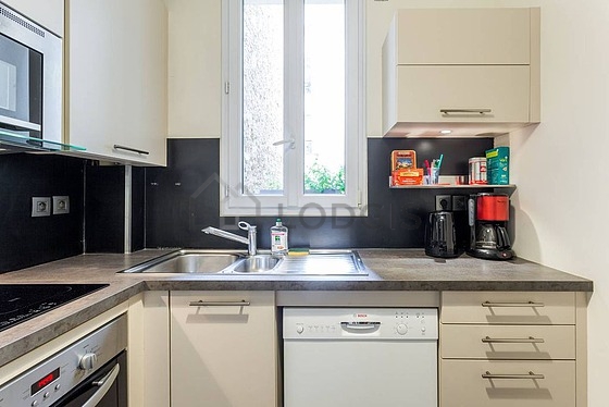 Kitchen where you can have dinner for 2 person(s) equipped with dishwasher, hob, refrigerator, extractor hood