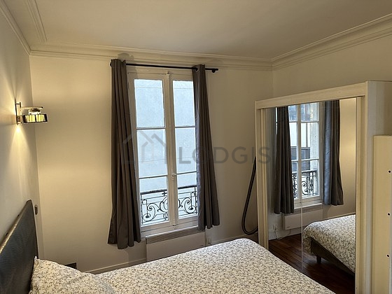 Bedroom with windows facing the courtyard