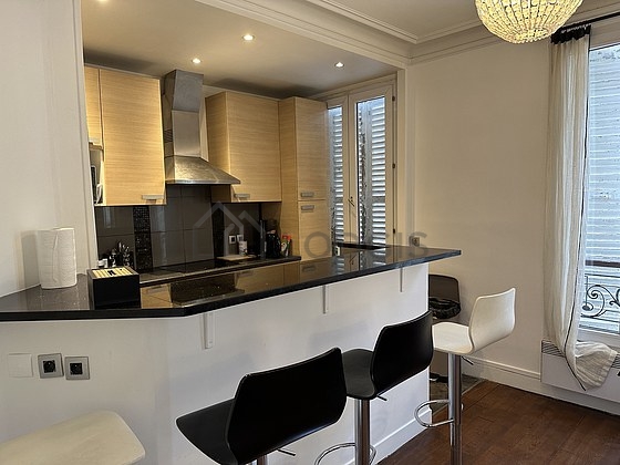 Kitchen where you can have dinner for 3 person(s) equipped with dishwasher, hob, refrigerator, extractor hood