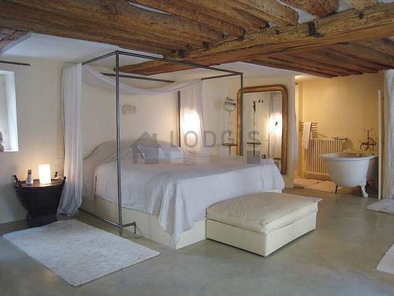 Bedroom with concrete floor