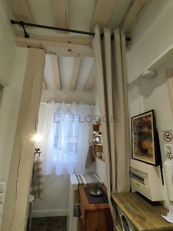 Kitchen equipped with washing machine, refrigerator, freezer, crockery