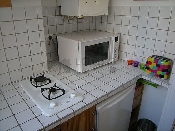 Kitchen equipped with washing machine, dryer, refrigerator, freezer
