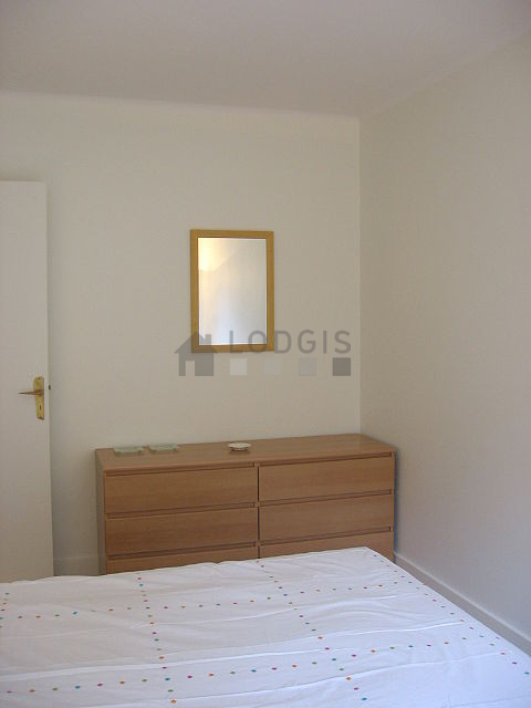 Bedroom with windows facing the garden