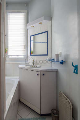 Beautiful and bright bathroom with double-glazed windows and with tilefloor