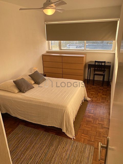 Bedroom with wooden floor