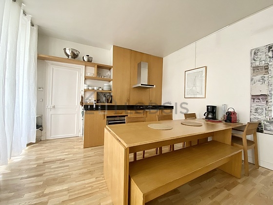 Kitchen equipped with dishwasher, hob, refrigerator, freezer