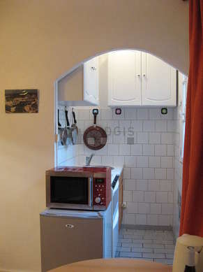 Kitchen equipped with hob, refrigerator, freezer