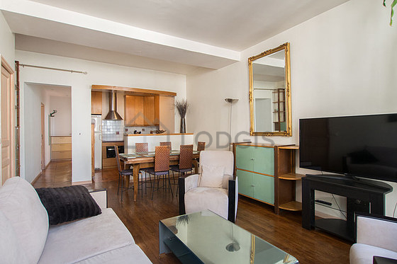 Living room with double-glazed windows facing the road