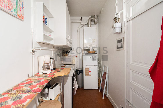 Kitchen with floor tiles floor
