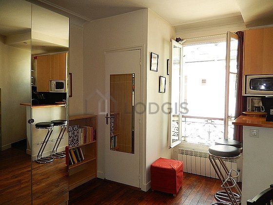 Bright living room furnished with 1 armchair(s), 3 chair(s)