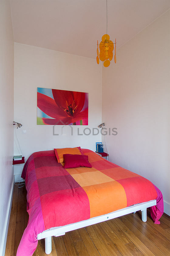 Bedroom with wooden floor