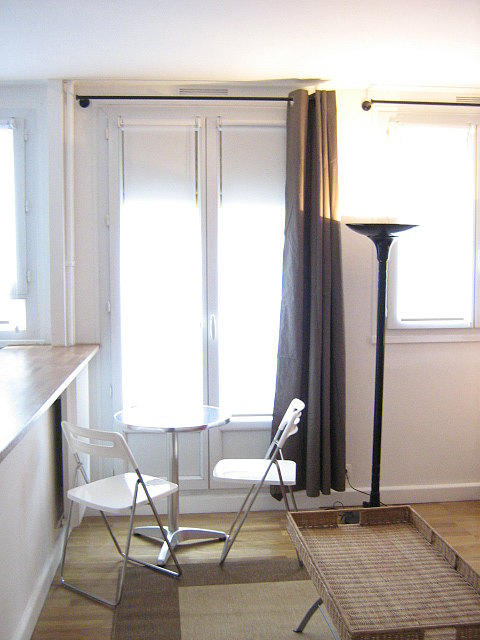 Quiet living room furnished with 1 sofabed(s) of 140cm, dining table, coffee table, wardrobe