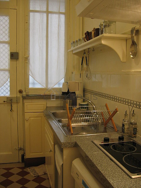 Kitchen with windows facing the courtyard