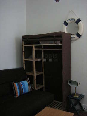 Quiet living room furnished with 1 sofabed(s) of 140cm, tv, wardrobe