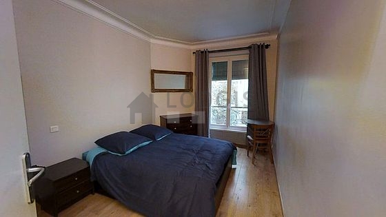 Chambre de 11m² avec du parquet au sol