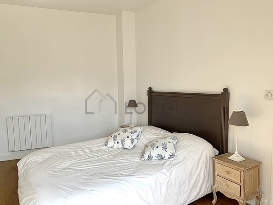 Bedroom with double-glazed windows facing the road
