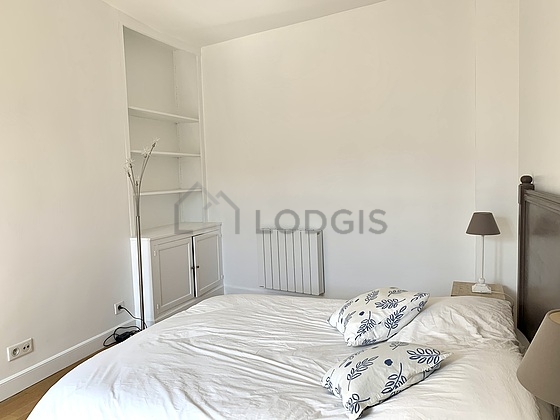 Chambre de 15m² avec du parquet au sol