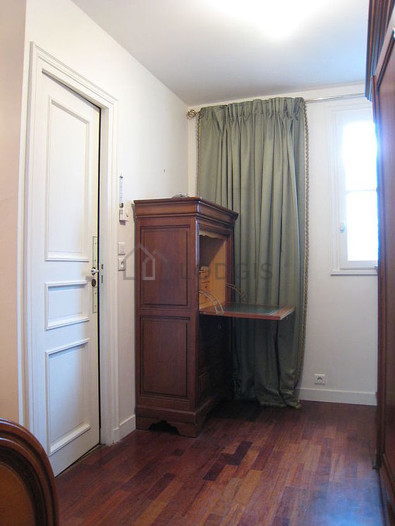 Bedroom with windows facing the courtyard