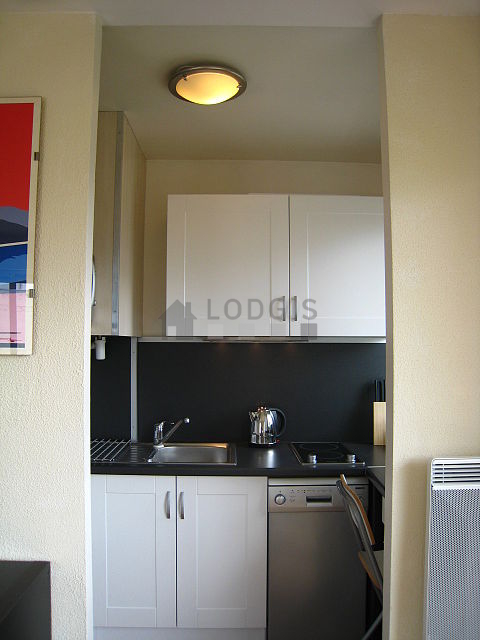 Great kitchenopens on the living room with tile floor
