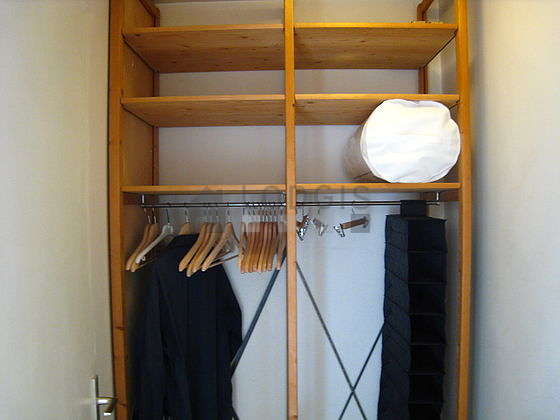 Beautiful dressing-room serviced with : wardrobe, shelves