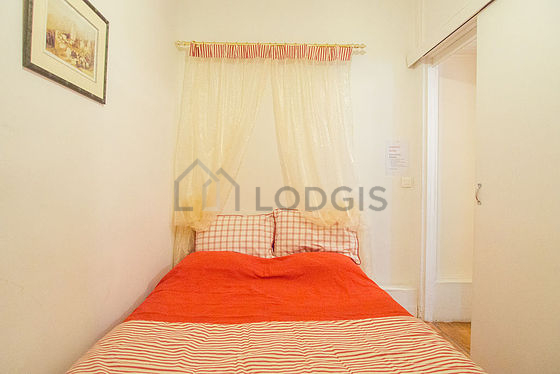 Bedroom with double-glazed windows facing the courtyard