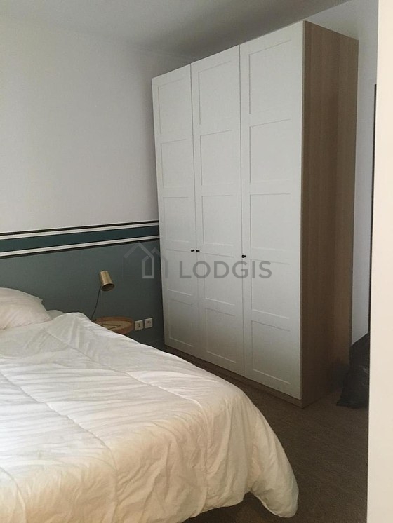 Bedroom with double-glazed windows facing the road