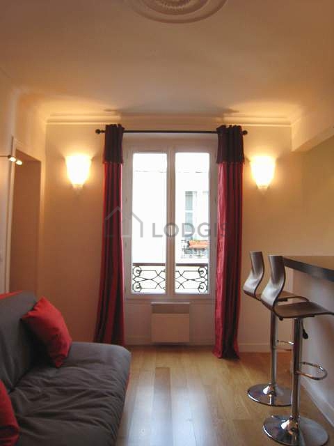 Living room with double-glazed windows facing the courtyard