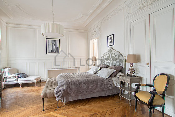 Bedroom with wooden floor