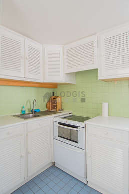 Kitchen equipped with dishwasher, refrigerator